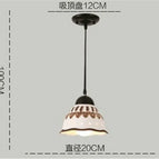 Pendentif à une tête