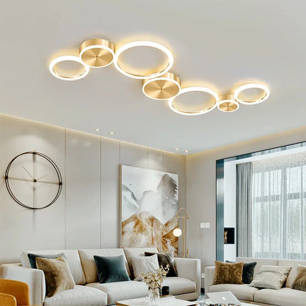 Plafonnier LED moderne en aluminium doré à anneaux pour salon — LZ4X9P2
