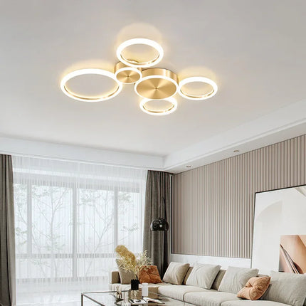 Plafonnier LED moderne en aluminium doré à anneaux pour salon — LZ4X9P2