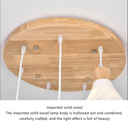 lustre long en bois massif style nordique pour villa