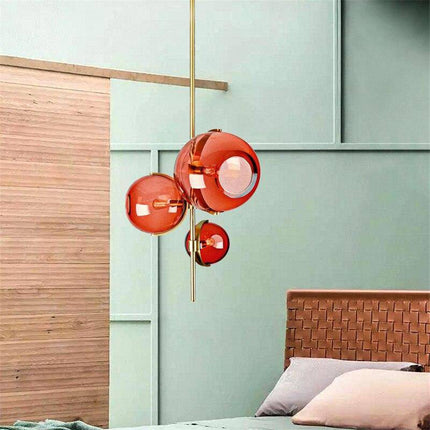 Suspension LED à tige dorée avec trois boules en verre rouge — LZ4X9T