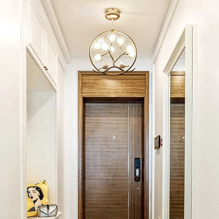 Lustre moderne avec arbre et oiseaux dans anneau Rhym